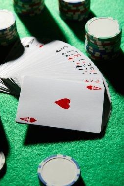 Live dealer rolling three dice in Lightning Dice studio